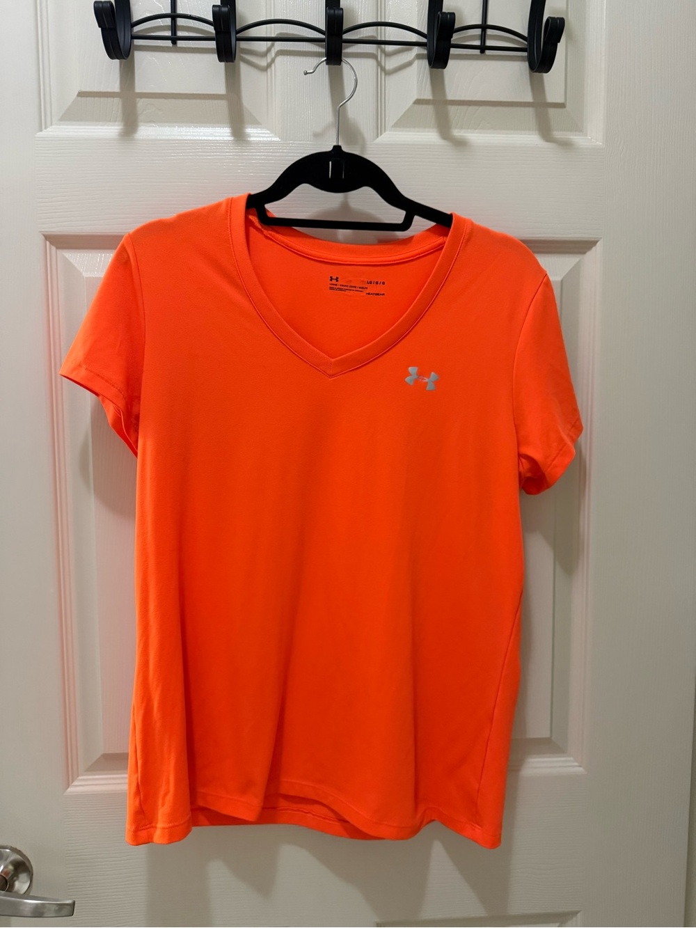 Under Armour Women’s Short-Sleeve V-Neck Tee in Bright Orange